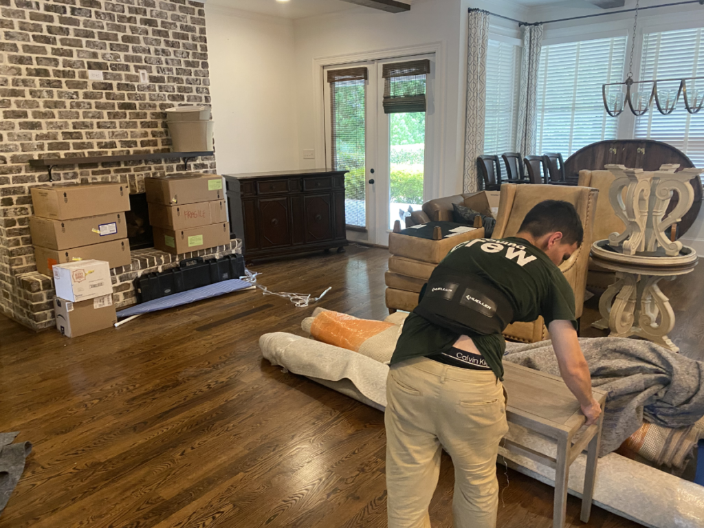 mover preparing to wrap a table